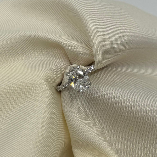 Platinum 2.00ct Oval Cut LAB Diamond Solitaire With Diamond Shoulders.