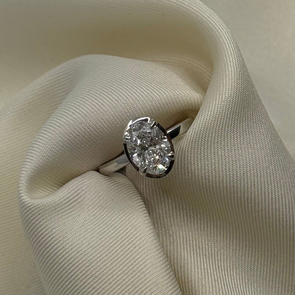Platinum 2.00ct LAB Oval Cut Diamond Solitaire With A Hidden Halo.