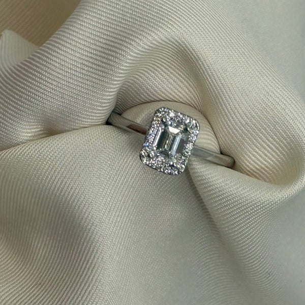 Platinum Halo Solitaire - Natural Mined Emerald Cut 0.76ct Diamond